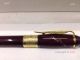 Montblanc Writers Edition Daniel Defoe Rollerball Pens Gold and Red (4)_th.jpg